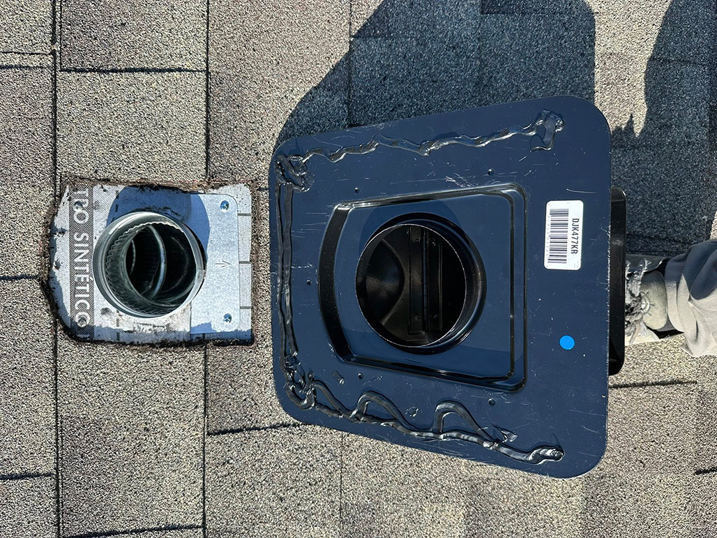 Roofer installing vent flashing